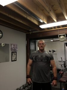 Dave in basement home gym