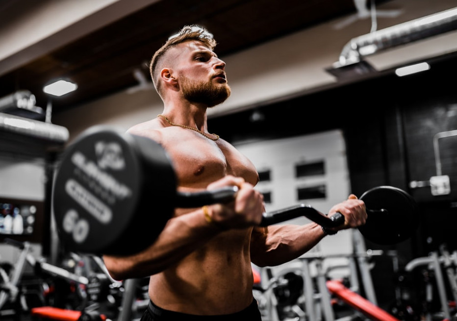 Bodybuilder Working Out at the Gym